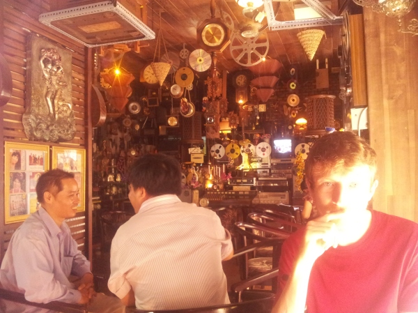 Conor in his favourite eccentric cafe of clocks in Vung  Tau